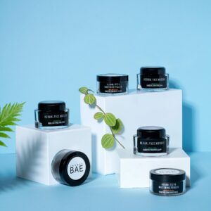 Clean and minimal skincare styling by a product photographer, showcasing Carbon Bae’s herbal masque and whitening powder.