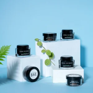 Clean and minimal skincare styling by a product photographer, showcasing Carbon Bae’s herbal masque and whitening powder.