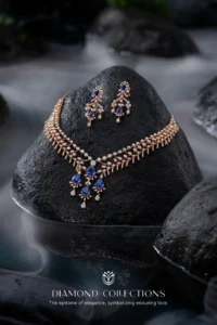 Tanmayi diamond and sapphire necklace on black stone with misty water