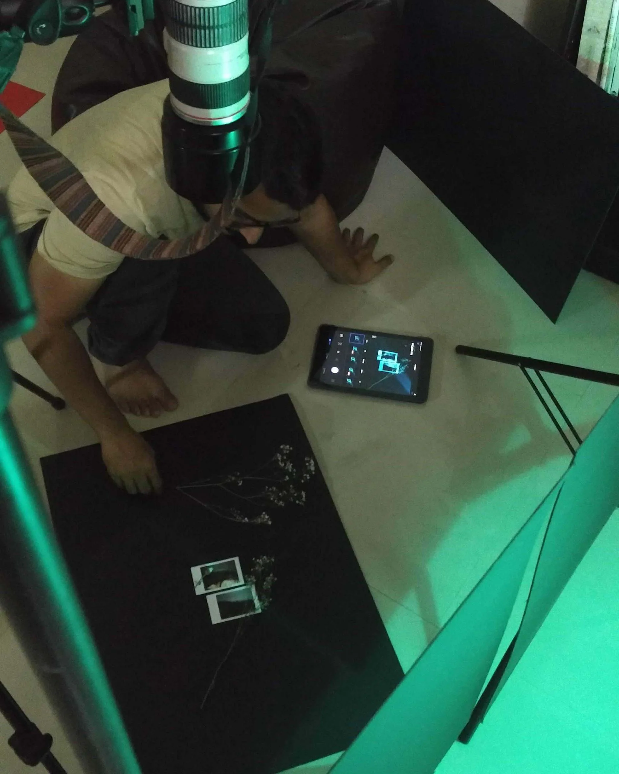 Behind-the-scenes setup for a creative flatlay photoshoot.