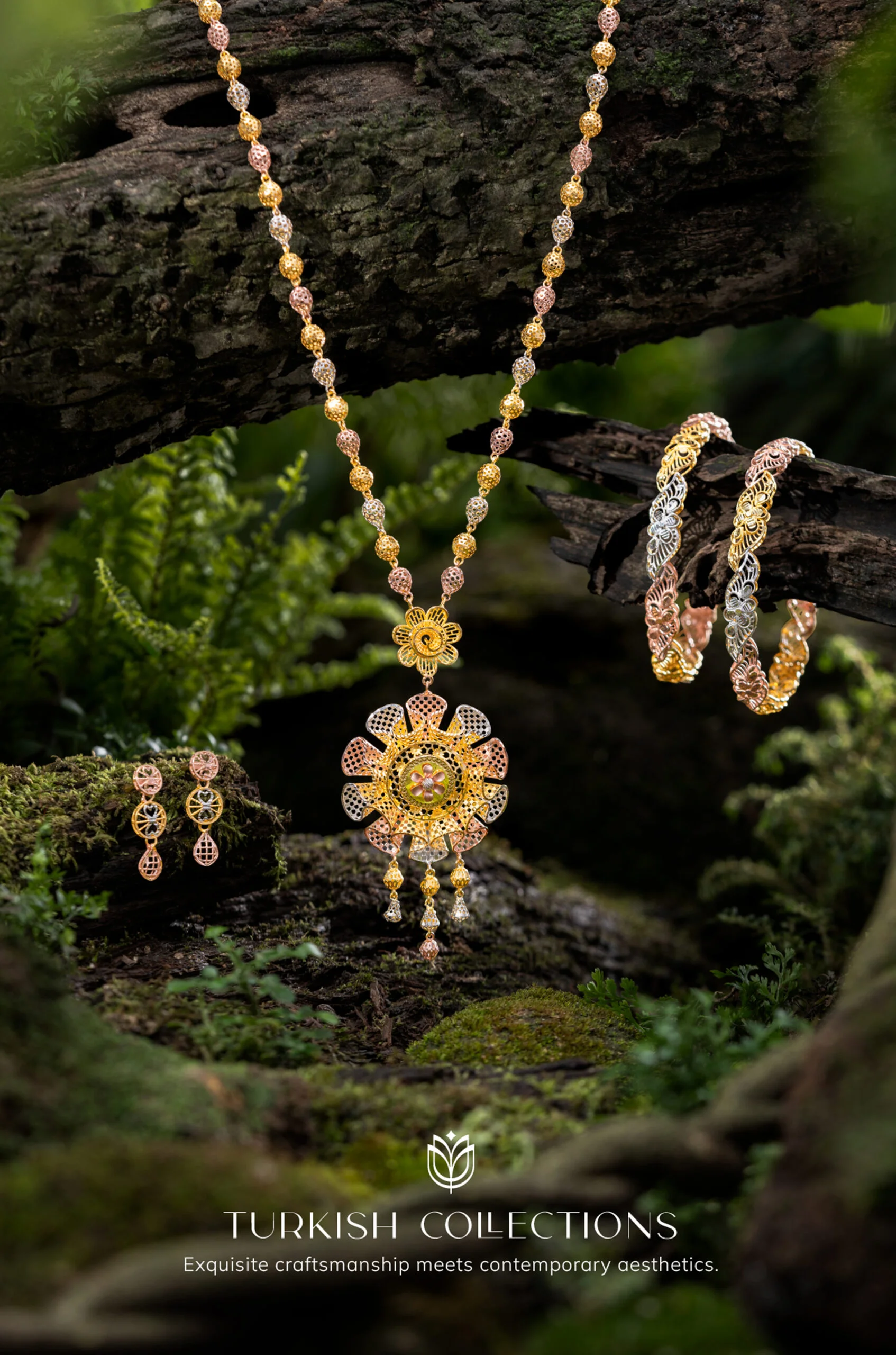 Intricate gold Turkish jewelry displayed in a lush forest setting.